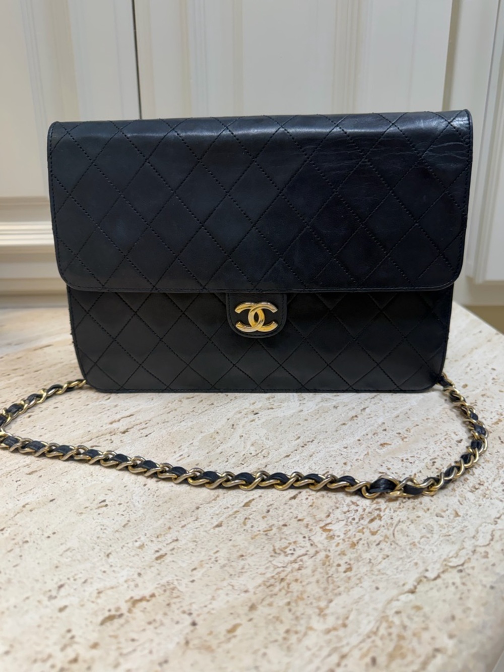 CHANEL Black Quilted Lambskin Crossbody with Gold CC Hardware